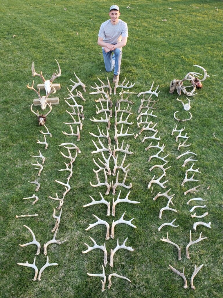 Brandon Mann and and whitetail shed antlers.