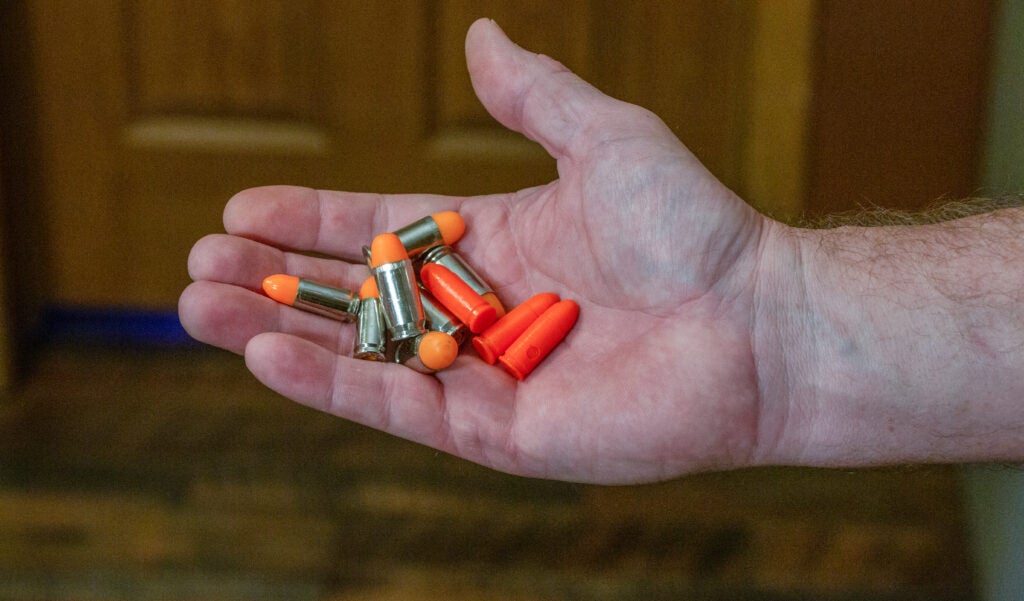 Handgun dummy rounds.