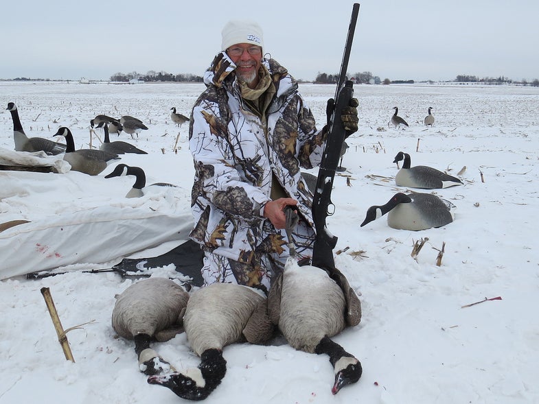 canadian goose hunter in the snow