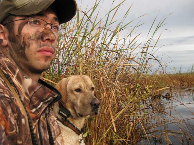 This is me and my 2 year old yellow lab, Dexter. It was opeing day 2008. It was his first opeing day and big debute in the duck blind and he did awesome!