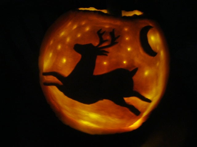 Whenever I think of majestic bucks, I think of them roaming the woods at night with the moon in the sky and stars shining bright. It's mysterious silhouette highlighted in the night sky gives me the goose bumps. I think this pumpkin represents the dreams of all us hunters and the respect we hold for nature.