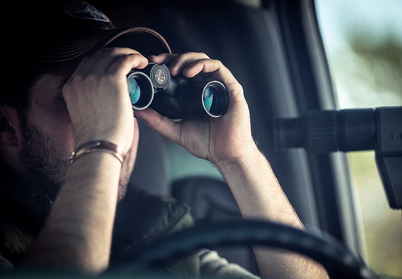 Use binoculars to scout deer activity