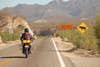 traveling baja california mexico by Kawasaki KLR650 dual-sport motorcycle to catch marlin roosterfish trout bonefish dorado shark jack and back to san diego up mexico highway one watching the baja 500