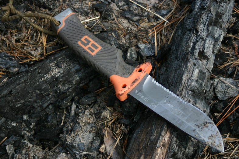The Ultimate Knife (suggested retail: $60), the first product representing Bear Grylls' collaboration with Gerber, comes with a firestarter, sharpener and emergency whistle packed in the sheath. On its own, the knife is a solid hunk of a blade. The drop point, 4.8-inch blade is nearly a ¼ inch thick at the spine, hollow ground, and made from 440A steel with a Rockwell score of 55-59 (57+/-2), making for good strength and easy sharpening. The handle has a great ergonomic shape that fits well in the hand with a double guard to prevent slippage and a textured rubber grip that's pretty sticky, even in wet conditions. Some will gripe about the fact that a full half of the edge is serrated. It's a personal preference and a full smooth blade option is not currently available on this knife. During my tests the serrations didn't impede the tool in any way, so take from that what you will.