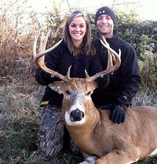 <strong>Lindsay Groom of Groveport, Ohio</strong>, tagged this 150-class 13-pointer with a crossbow the day after her second wedding anniversary, with her husband Kevin by her side. Read on to find out how this buck-of-a-lifetime became a late anniversary present for this hunting couple.