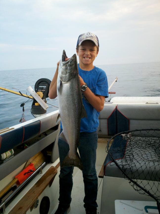 Mitch and his dad went fishing with their neighbor on Lake Michigan on July 14th. Mitch caught this nice 13lb king along with 3 other fish. Great Day!!