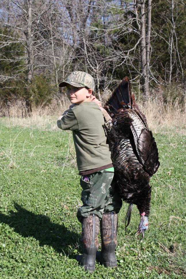Austin,9,shot his first turkey on the first morning of Missouri's spring youth turkey season.After passing on two jake's earlier in the morning Austin's patient's paid off with this 20lb.Tom with 9 7/8 beard &amp; 7/8 spurs.The gobbler was shot @ 26yds. with a 1187 12ga.On the Grellner family farm in Osage County Mo.