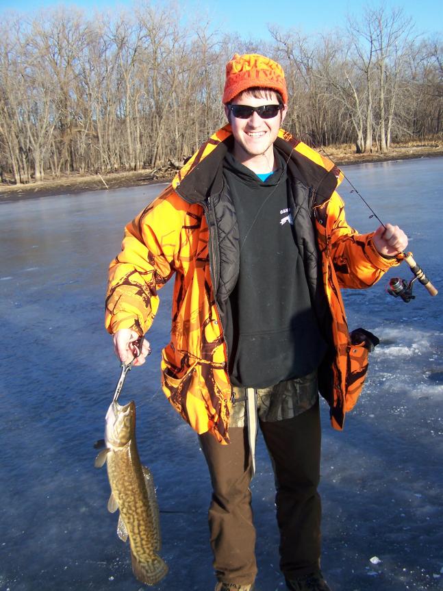 My friend caught this 24'' Bowfin a few weeks ago while fishing for bluegill through the ice on the Mississippi River! After a 5 minute fight we discovered the fish was not a northern, which we thought the first time he went past the drilled hole...