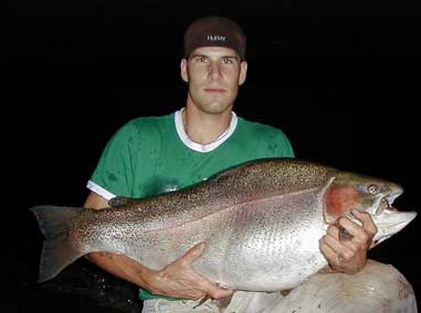 By Kirk Deeter It may not be the most coveted fishing record in the books ... but it's close. On June 5, Adam Konrad of Saskatoon, Saskatchewan, landed a pending International Game Fish Association (IGFA) all-tackle world record rainbow trout that tipped the scales at a hefty 43.6 pounds. Konrad, 26, who was fishing with his identical twin brother, Sean, caught the monster in Lake Diefenbaker in southern Saskatchewan using a 4-inch Mepps Syclops while fishing from the shore. He was using <em>six-pound-test</em> line. The trout had a 34-inch girth -" big enough to fill out a pair of Levi's.