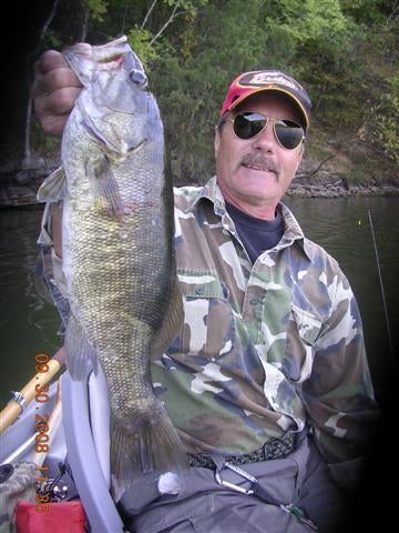 In Sept of 2008 I was crowned "ELITE" Angler of the month by Hank Parker &amp; berkleybigfish.com/somefishinfool &amp; was awarded a ABU Garcia REVO Prem reel. This one of the first fish I caught with it. 22" Smallmouth on Lake Chickamauga,TN. After a day of non-stop action, it was my NEW "LUCKY ROD"