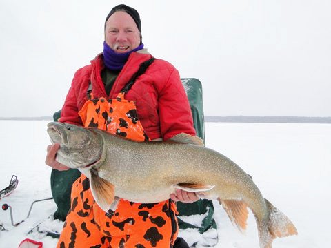 Ice Fishing World Record: Angler Releases Huge Lake Trout in Canada