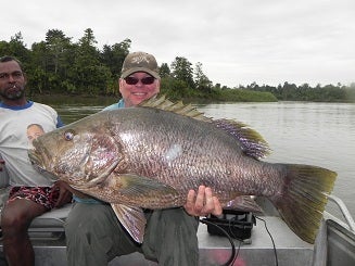 I was fortunate to land a 40 pound PNG black bass.The PNG black bass is declared the King of freshwater fish!! We landed bass at 40lbs, 40lbs, 42lbs, and 46lbs. Plus we landed record size barramundi with 2 exceeding 70lbs. Trip are ran by Jason Yip of Wild River Fishing PNG.