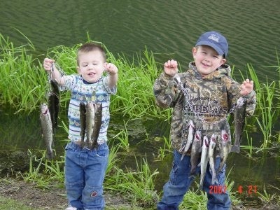 My son William and Nephew Landon with their stringers of rainbows at a local fishing tournament for kids. William won second place for his age group and took home a nice trophy and prizes, not bad for a 2 year old.