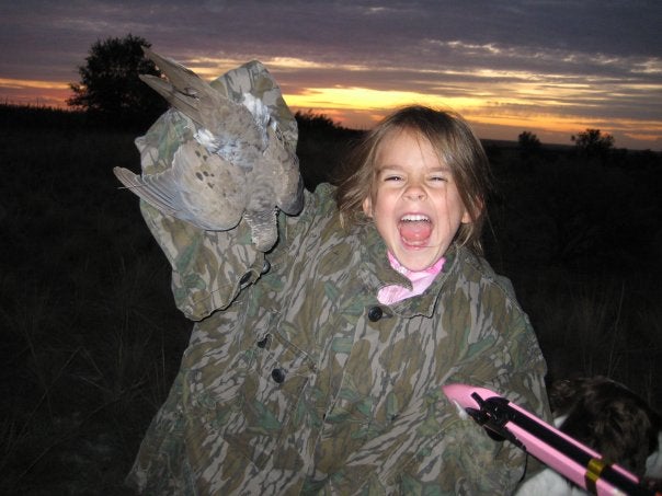 My 5 yr old daughter helps dad during the 2009 dove opener.
