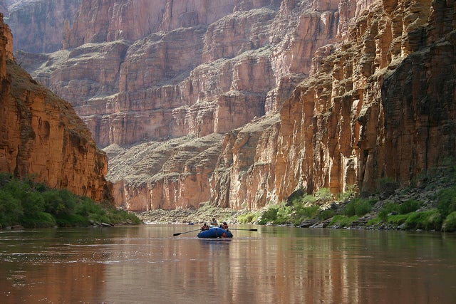 A raft floating the Colorado River in the Grand Canyon, courtesy of <a href="http://www.nps.gov/grca/planyourvisit/whitewater-rafting.htm">Grand Canyon National Park</a>.