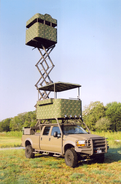 Custom built truck from texas. Has a 30 ft scissor lift. Built in feeder built onto back as well.