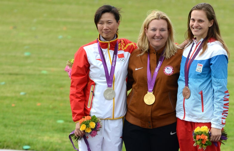 When <a href="http://www.nbcolympics.com/athletes/athlete=kim-rhode/index.html">Kim Rhode</a>, then 17, stood on the podium at the 1996 Olympic Games in Atlanta with her first gold medal hanging from her neck, she never dreamed 16 years later she would make history in London at the <a href="http://www.london2012.com/">2012 Summer Olympic Games</a>, but that's exactly what happened this morning. Rhode, 33, set a new Olympic record in qualifying for Women's Skeet with 74 hits out of 75. She went on to match her own world record with a perfect 25 in the final for a total of 99 out of 100, winning the gold. She is the first U.S. athlete in history to medal in an individual sport at five consecutive Olympic Games. Before today, Rhode had collected two gold medals in the Double Trap event in 1996 and 2004, a bronze in 2000 and a silver in the Skeet at the Beijing 2008 games, cementing herself as one of the best competitive shotgun shooters in the world. And she's not done yet. "I do not see myself quitting any time soon," Rhode says on the <a href="http://www.london2012.com/news/articles/rhode-shoots-historic-gold.html">official Olympics website</a>. "I'm looking forward to 2016 and a few more after that. The oldest Olympic medalist was a shooter and he was 72, so I still have a few more in me." That means continuing her intense training schedule. Rhode shoots as many as 500 to 1,000 shells a day and has continued a dedicated practice routine for 23 years. She estimates she has fired as many as 2 million shotshells in her life. China's Ning Wir took the silver in Women's Skeet and Slovakia's Danka Bartekova won bronze after a shoot-off with Russia's Martina Belikova. <em><strong>Keep clicking for more photos from the event and of Rhode's win!</strong></em>