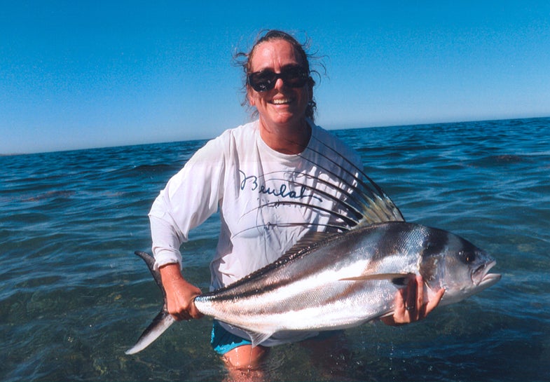 <strong>Margaret Angier Shaughnessy<br />
Medford, Oregon, USA<br />
Roosterfish (Nematistius pectoralis)<br />
Women's 10 kg (20 lb) Tippet Class Record<br />
Weight:</strong> 9.53 kg (21 lb)<br />
<strong>The Lowdown:</strong> Shaughnessy recently traveled to Bahia de los Sueños, Mexico with hope to add to her current record count for roosterfish, where she already holds records in the women's 4 kg (8 lb), 6 kg (12 lb) and 8 kg (16 lb) tippet classes. Guided by Marco Antonio Green Lucero, Shaughnesssy landed a spectacular roosterfish on May 29, 2011 from the shore. To make the potential record catch even sweeter, the fish was released alive after being weighed, measured and photographed. The current IGFA record is 8.55 kg (18 lb 13 oz).<br />
<strong>Bait Used:</strong> Kinky muddler fly