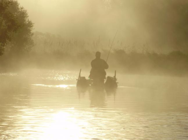 This picture was taken while Smallmouth bass fishing on the Fawn River in Indiana. The sun was doing it's best to burn through the fog. Within five minutes of taking this picture, the fog was gone.