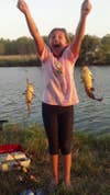 My daughter and I were fishing and we threw two lines in the water and I was going to let her do all the work that night. Within a minute she had that little guy on the line and not 15 seconds later had the bigger one hooked. She reeled the first one in and then reeled in the second one. She was so excited because she did it all herself.