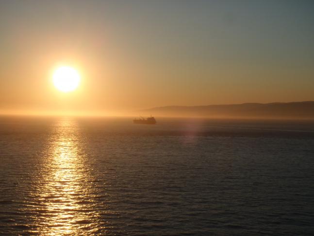 A nice shot of an Alaskan fishing boat at sunset. I took this from a cruise ship on my honeymoon.