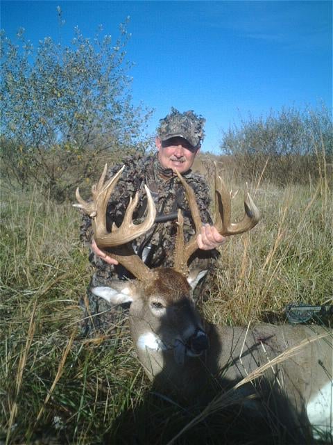This is my fathers (Steve Harmon) recent kill from Illinois. It was later in the day and way to hot outside for big deer to be moving or so he thought. After setting up where a 126 class deer was seen crossing earlier it wasn't long till this monster came within ten yards of him and made a rub. Seconds later he made his draw and a perfect shot.