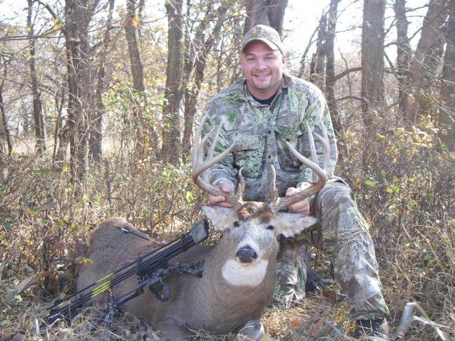 I shot this buck on November 4, 2008(Election day), in central Kansas. It was a 38 yard quartering away shot that I thought was a bad hit!I gave him 2 hours and 17 minutes. 20 minutes and a half a mile later I got to see that it was a good hit, taking out his diaphram and left lung. The buck scored 172 7/8 inches and weighed approximately 300 pounds on the hoof. Jason Leeper