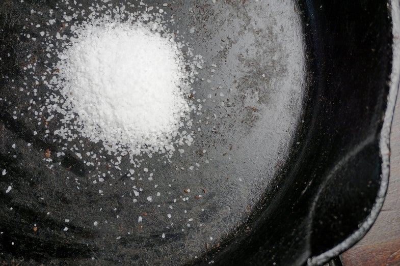<em>Salt is a secret weapon for cleaning cast-iron pots and pans.</em>
