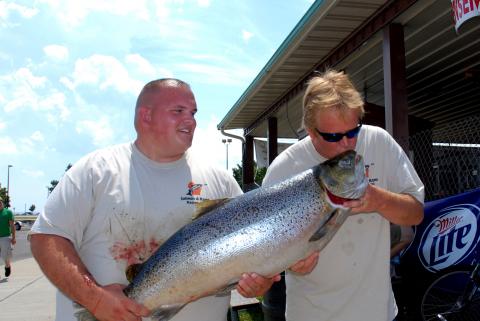 <a href="/photos/gallery/fishing/2010/07/wisconsin-angler-lands-potential-world-record-brown-lake-michigan/"><strong>#15.<br />
Angler Lands Potential World-Record Brown in Lake Michigan</strong></a> Roger Hellen likely set a new world record when he hauled this 41-pound, 8-ounce brown trout from Lake Michigan Friday July, 16, during the 35th annual Salmon-A-Rama Sportfishing Tournament in Racine, Wisconsin. Hellen (right, with fishing partner Joe Miller) boated the big brown while trolling off Wind Point, north of Racine. <a href="/photos/gallery/fishing/2010/07/wisconsin-angler-lands-potential-world-record-brown-lake-michigan/">Read the story and see the photos here.</a>