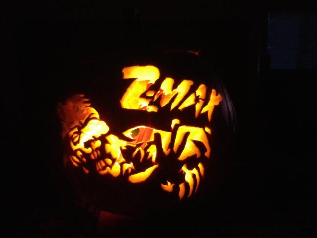 Inspired by the current Zombie Apocalypse and Walking Dead trends, I carved out this zombie pumpkin. You can't tell from the picture, but there are pumpkin gut 'brains' out the forehead. Thank You Z-Max!!