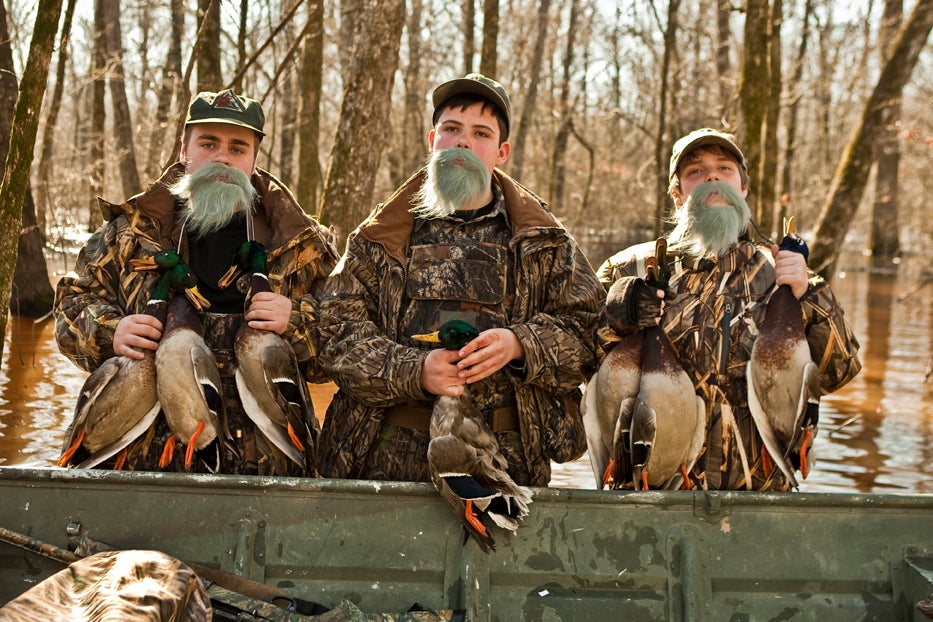 Brothers Cody (left) and Tyler Ward and their friend George Peters III (center) wore Duckmen beards in homage to their favorite celebrity duck hunters after a successful outing during ­Arkansas's Youth Waterfowl Hunting Days weekend in late January.<br />
<strong>Location:</strong> Almyra, Arkansas <strong>Issue</strong>: November 2009