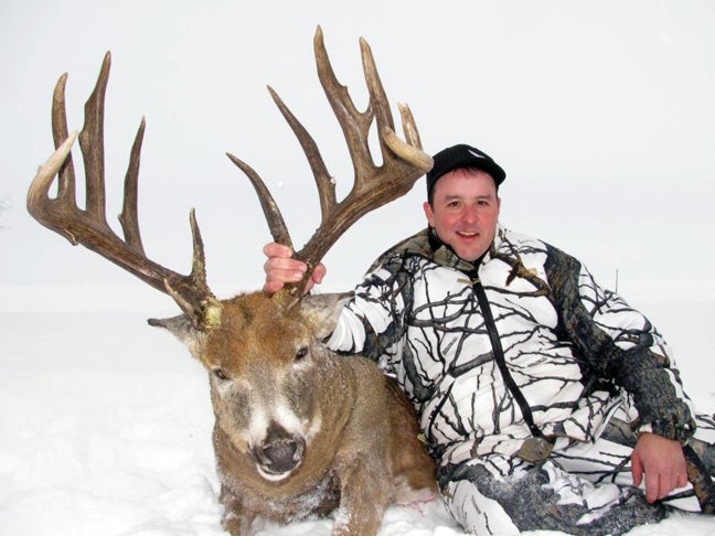 <strong>On the last afternoon</strong> of a six-day hunt in Alberta, Canada, with temperatures below zero and 18 inches of snow on the ground, Oklahoma rancher Devin Moore was ready to "settle" for a 150-class whitetail buck that his guide had just spotted 200 yards in the distance. What Moore got instead--after a well-timed grunt call and a heart-pounding struggle to get his frozen rifle to fire--was a 200-plus-inch typical that should move his name to the top of the Safari Club International record book.