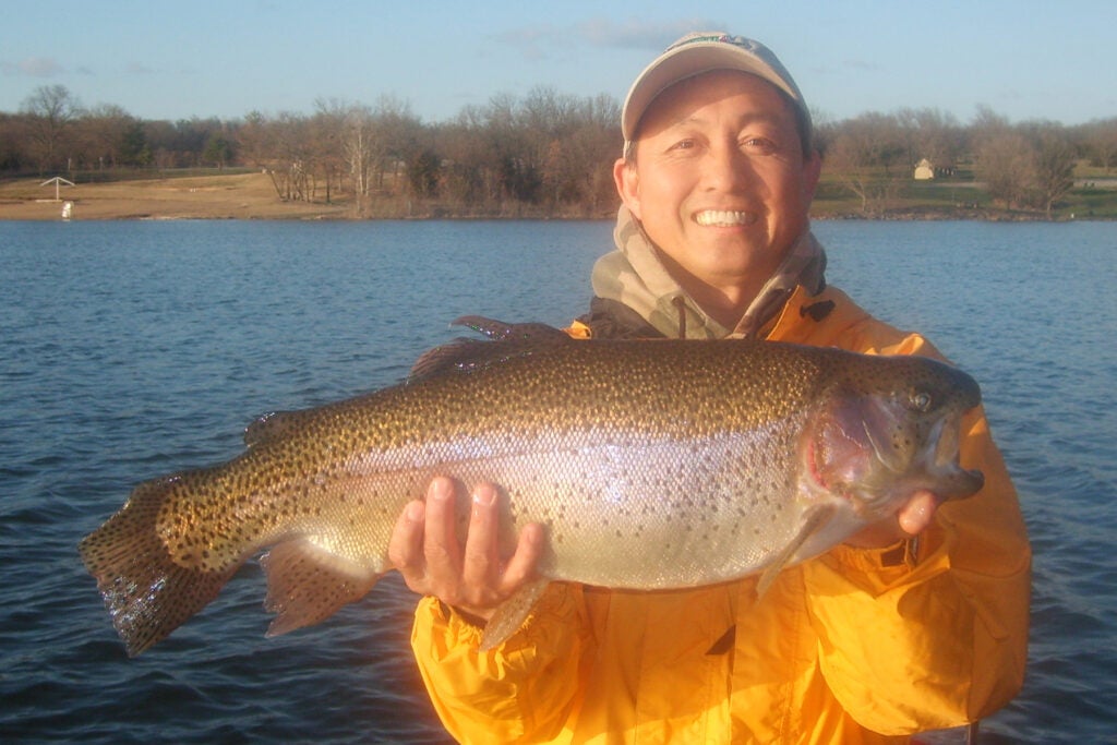 Chasing big fish is also a family affair for Eric Chia, who took this state record 10.29-lb. rainbow trout March 28 at Shawnee Mission Park Lake.