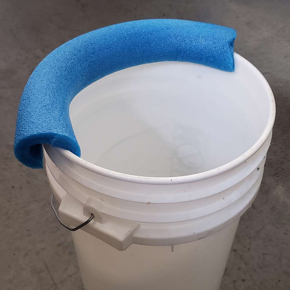 pool noodle lining a bucket