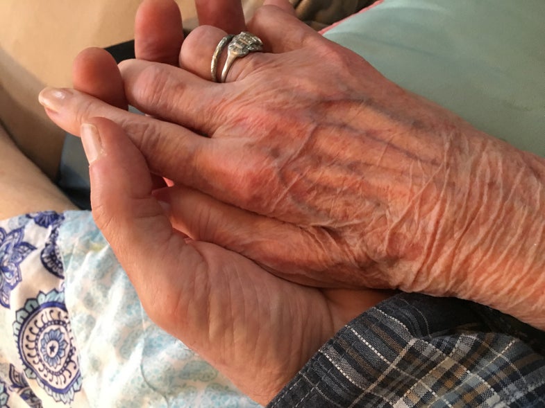 bill heavey holding his mother's hand