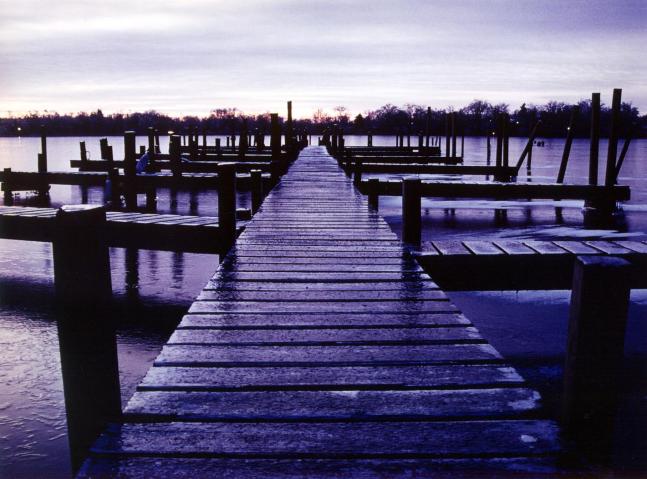 The old docks on Lake Fenton, at dusk after an ice storm. Too late in the season to tempt the ice and too early for the boats.