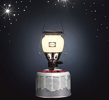 Not Your Father's Lantern<br />
By Peter B. Mathiesen<br />
Whether you're camping out near a trout stream in summer or in a wall tent on a fall elk hunt, having a reliable lantern makes life a lot more enjoyable. And as millions of Gulf Coast residents can attest, lanterns can be lifesavers during emergencies. We compared three propane lanterns for convenience and brightness, and then tested three alternatives. Here's what we uncovered. The Test: Lanterns<br />
I measured the following three propane lanterns with a Canon handheld digital light meter under similar conditions and found that the Coleman Pinnacle was 10 percent brighter than the Brunton, which was 60 percent brighter than the Primus. Of the non-propane group, the Coleman NorthStar was the brightest of the three, just shy of the Brunton. Battery lights can't compare to fuel-"the Essential Gear measures at only half the glow of the miniature EasyLight, and the Gerber at much less than that.