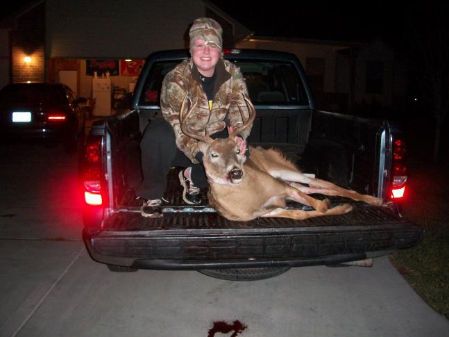 This is my daughter's first deer she is 21 yrs old. We decided to have some father/daughter time. We were in a box blind in Stafford County, Ks. We had over 60 deer all around the blind(all does) from 20 yds to 300 yds away when this buck came out behind us. She stayed calm put the cross hairs on it and had a clean one shot kill.
