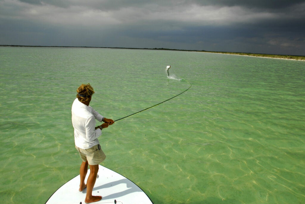 In April, Beau Strathman hooked this 80-pound tarpon off the coast of Andros Island, jumping the fish five times. "I was casting a small, sparse cockroach imitation that I tie," Strathman says. "I think a lot of shop flies are too gaudy for these fish." He fought the tarpon for less than 10 minutes before straightening his rod, holding the line taut, and breaking the fish off. "Tarpon need to keep their strength down here," he notes. "Bull sharks like to follow them."<br />
<strong>Location</strong>: The Bahamas<br />
<strong>Issue</strong>: July 2009