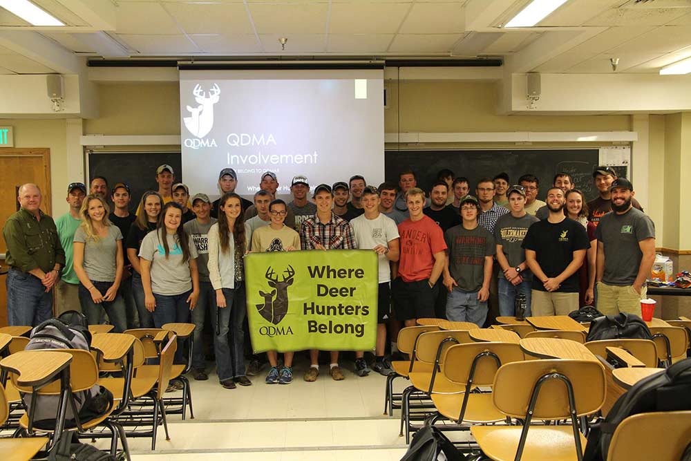 group of hunters standing in a room at purdue