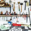 racks of shop room tools used in gun restoration