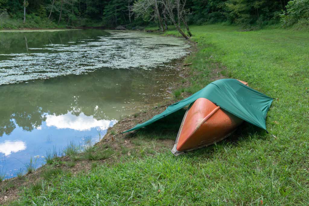 a shelter made from a kayak