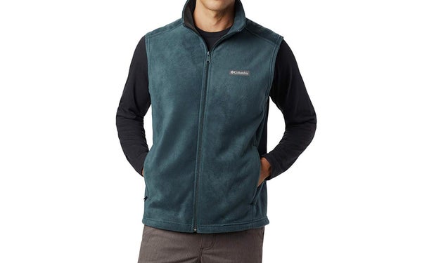 Man wearing green Columbia fleece vest
