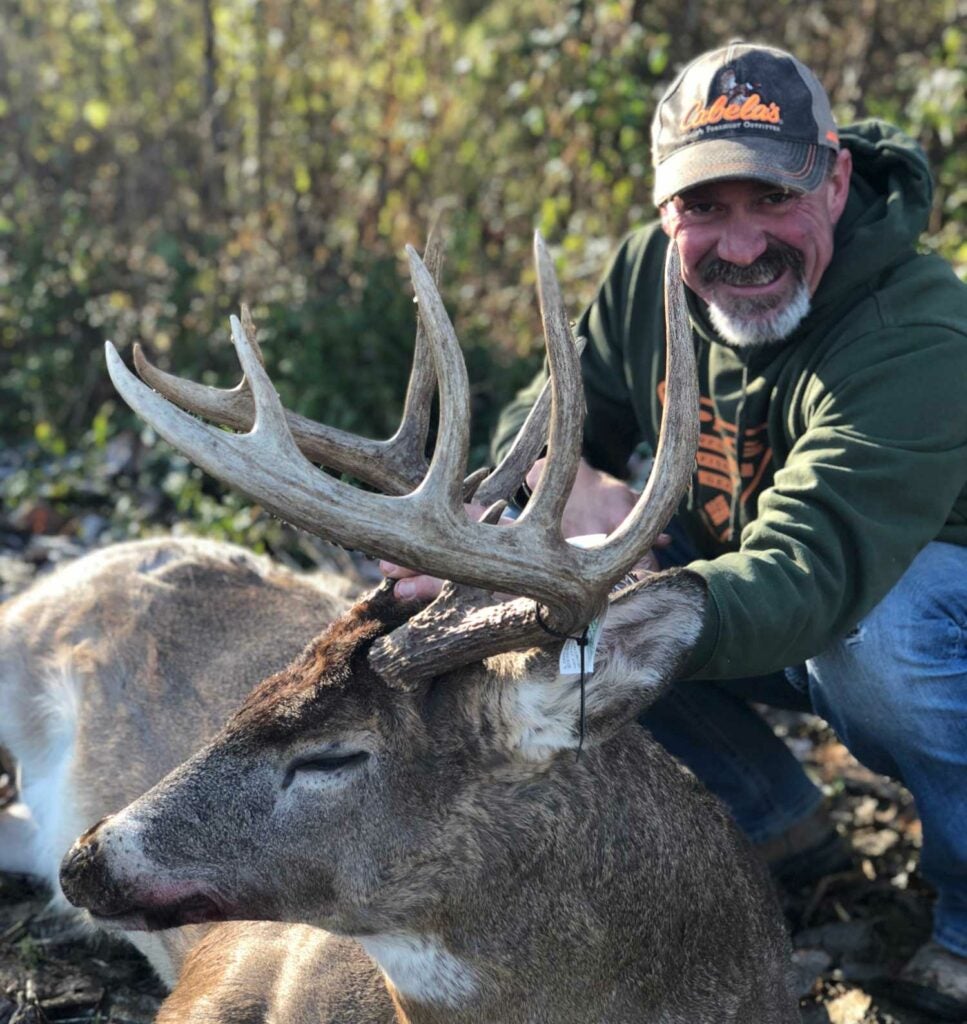 Tommy Paul, head guide with Buck Quest outfitters, with a great buck he killed from the ground last year.
