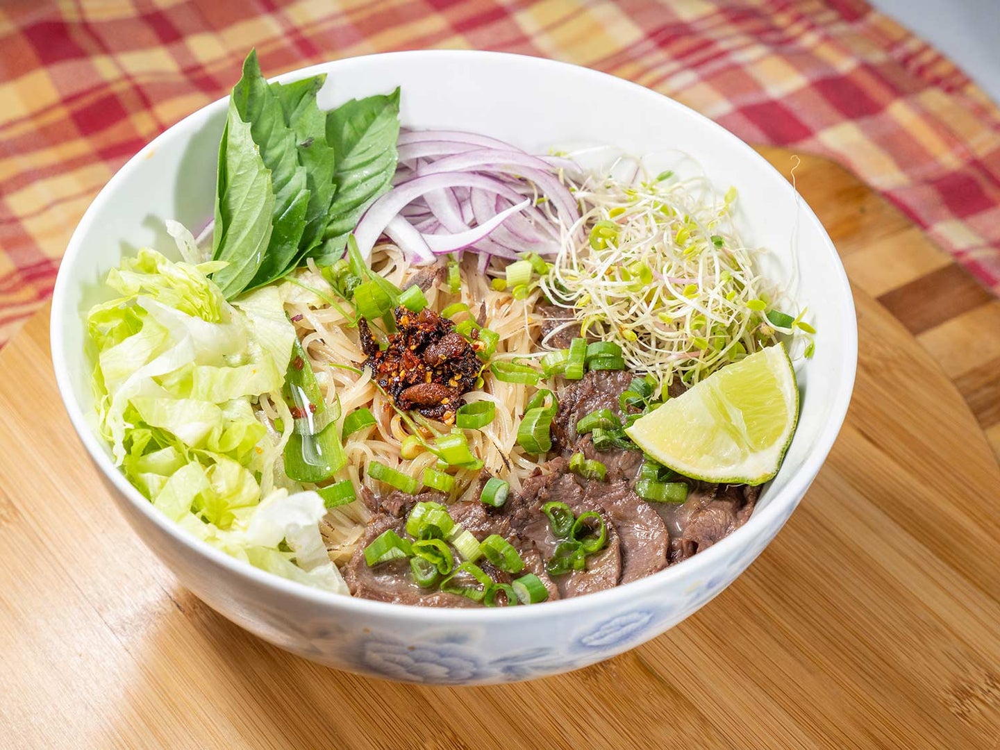 A warm bowl of pho is a restorative meal on a cold winter night.