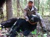hunter with black bear.