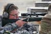 Hunter aiming a Remington model seven rifle in 6.5 Creedmoor.