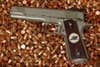 A handgun on an ammo reloading handgun.