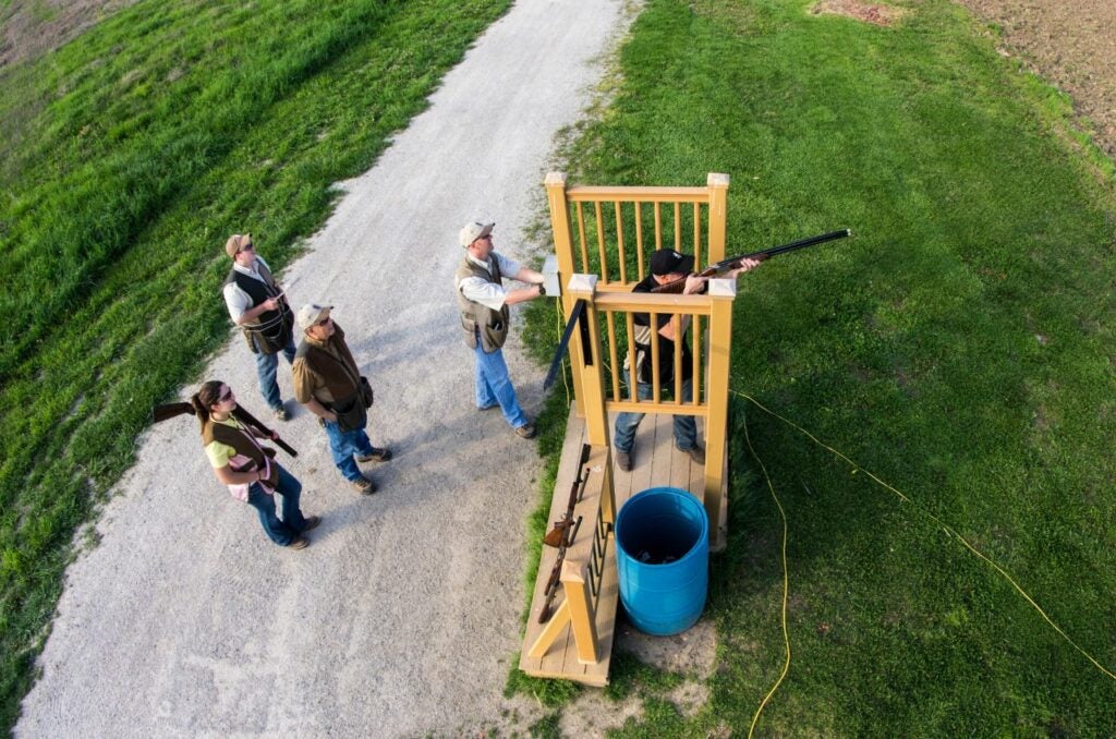 a group of shooters at a sporting clays course.