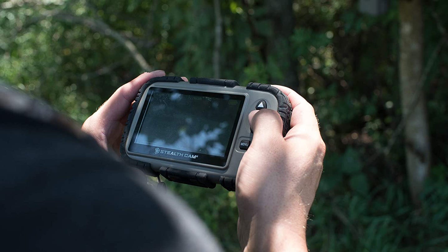 Person holding an SD viewer